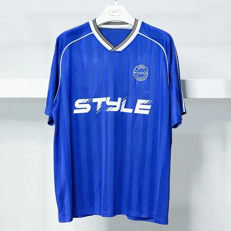 kf-S838a6a0bfdfc4194b2c7fcaba2bbc5aeA.webp European and American Street Fashion Brands Loose Fit for Couples American Retro Sports Jerseys Short Sleeved Football Jerseys